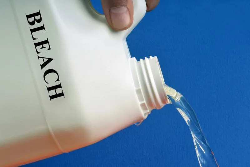 bleach being poured