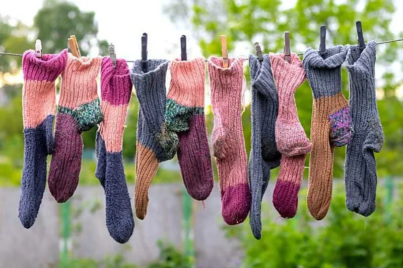 socks hanging on a line to dry