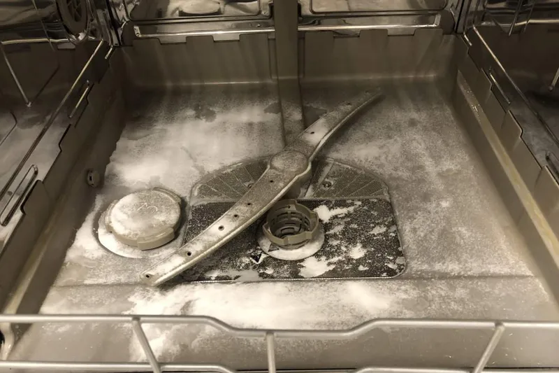 baking soda on the bottom of a dishwasher