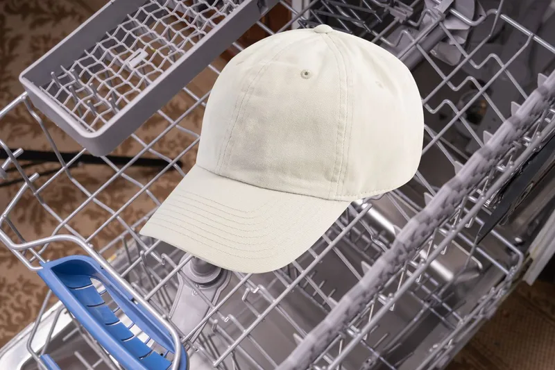 baseball cap in dishwasher