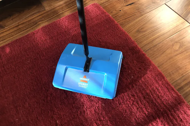 bissell floor sweeper on a carpet