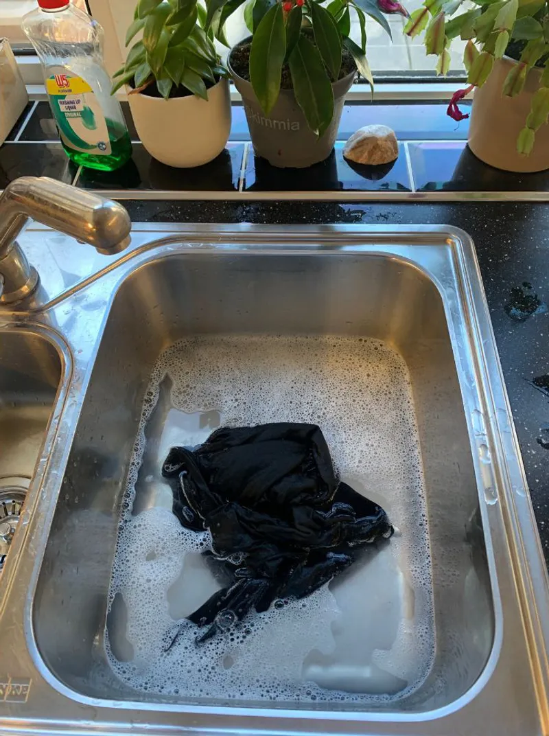 black clothing in the sink