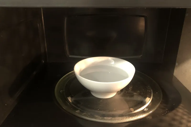 bowl of water in a microwave