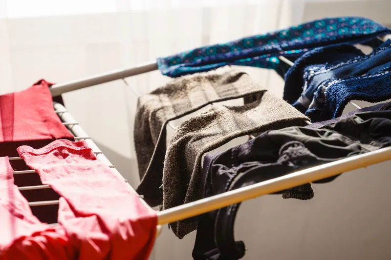 clothes drying on a drying rack