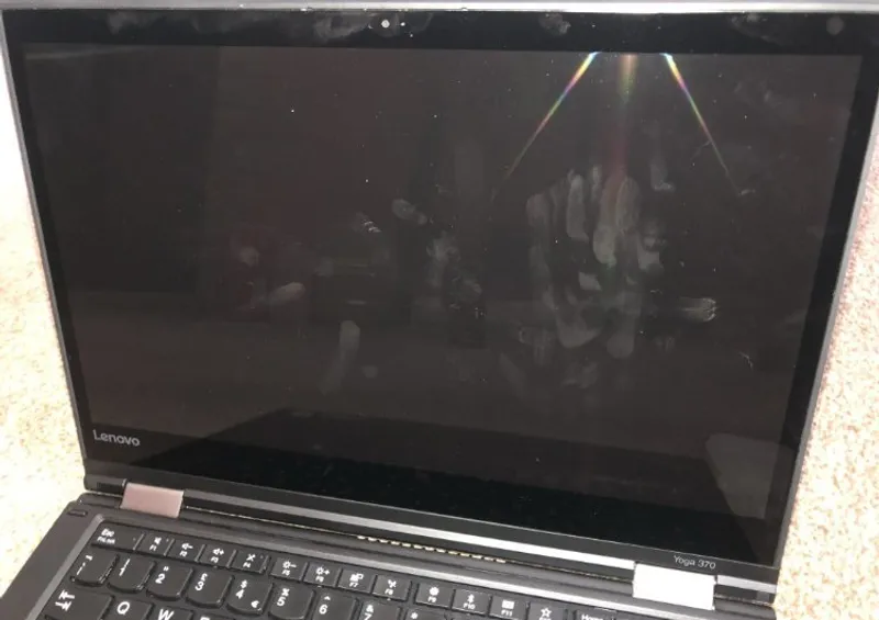 dirty laptop screen with smudges