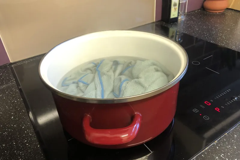 dishcloths in boiling water