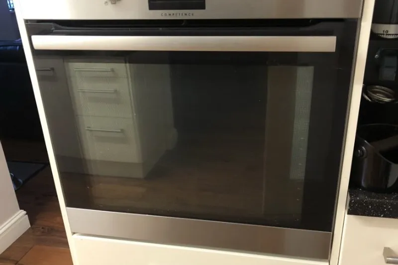 front of oven