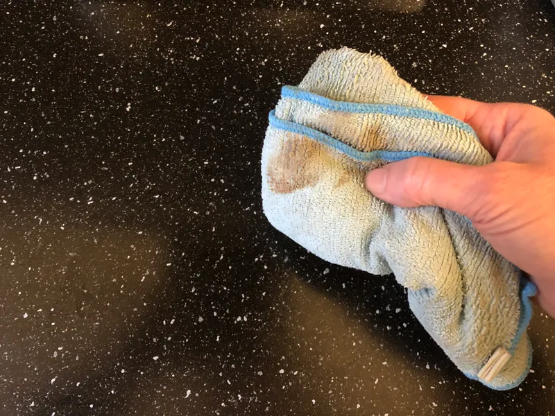 microfiber cloth with tannin marks on it after wiping the worktop