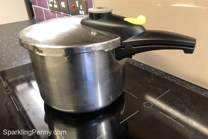 pressure cook sitting on an induction hob