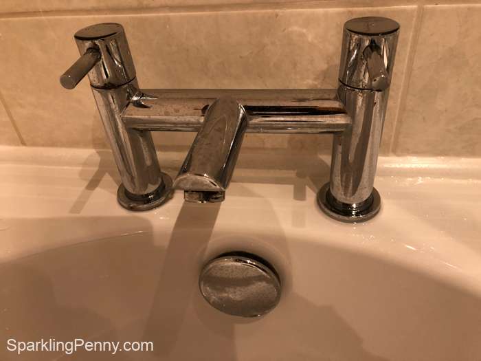 clean taps after cleaning off black mold