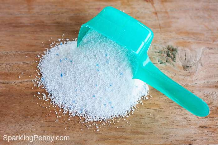 scoop of washing detergent for cleaning microfiber cloths