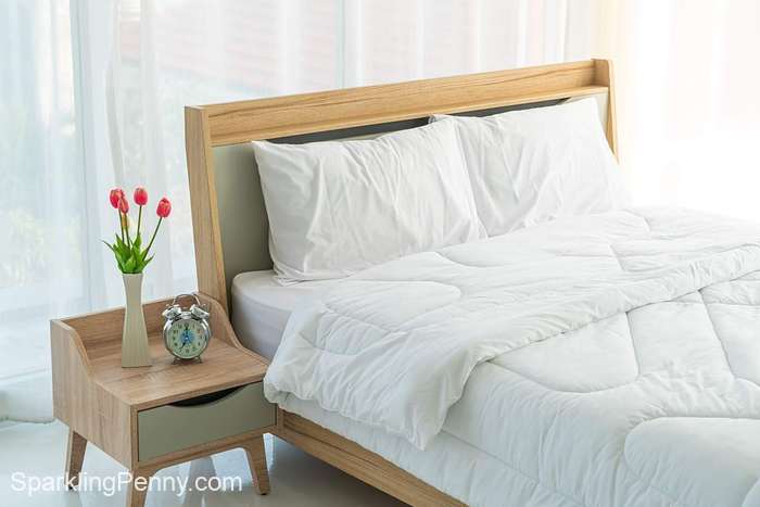 bed with white duvet