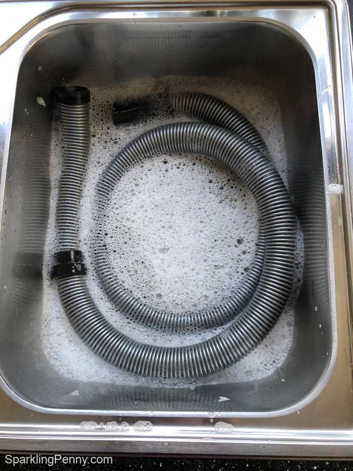 vacuum hose in soapy water