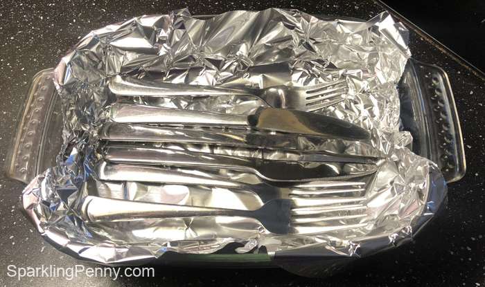 cutlery laying in the dish