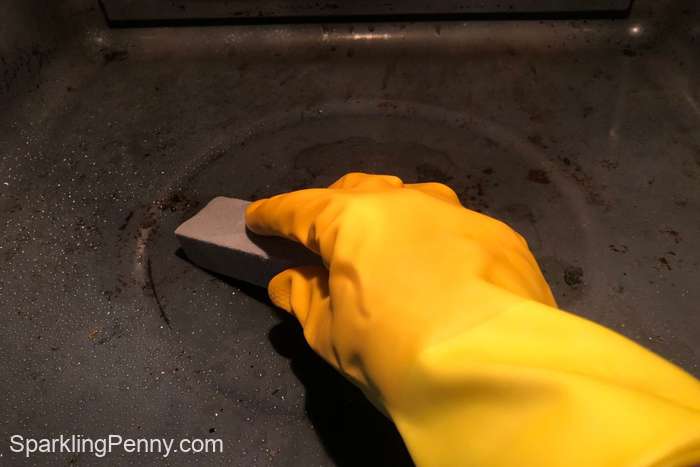 cleaning an oven with a pumice stone