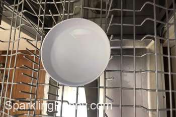 bowl of vinegar in top rack of dishwasher