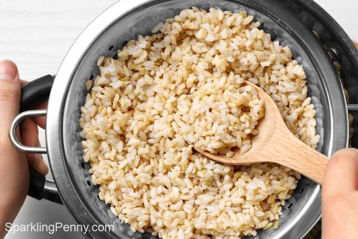 brown rice cooking in a saucepan
