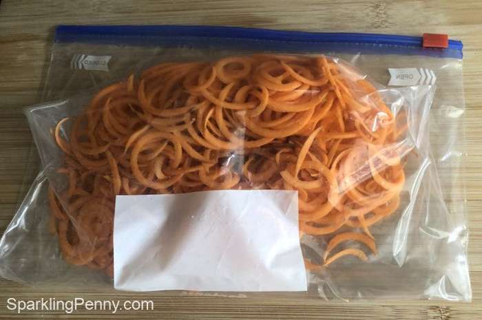 spiralized sweet potato in a ziploc bag ready for freezing