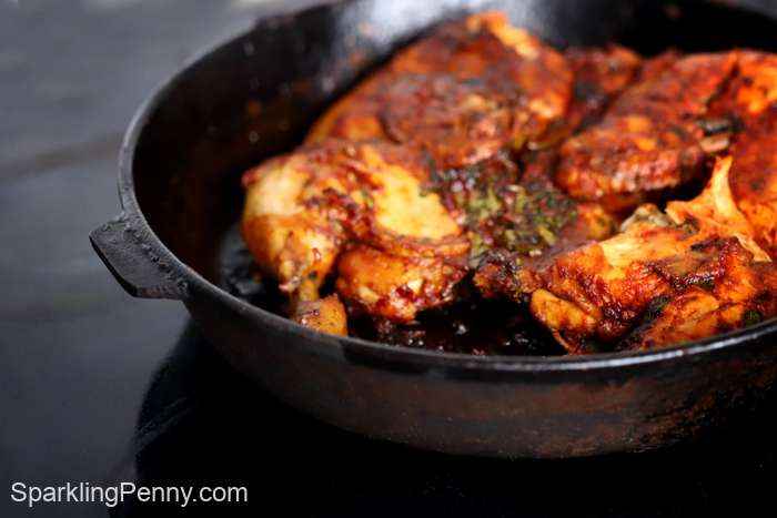 chicken reheating in a skillet