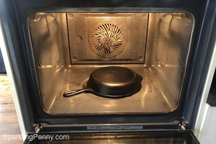 cast iron skillet in the oven ready for self-cleaning cycle
