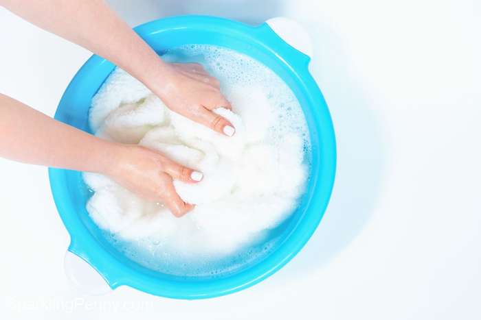 hand washing a bath mat