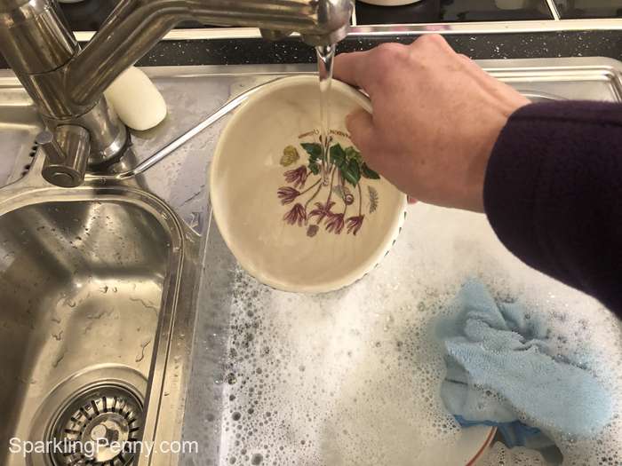 rinsing a plate in cold water
